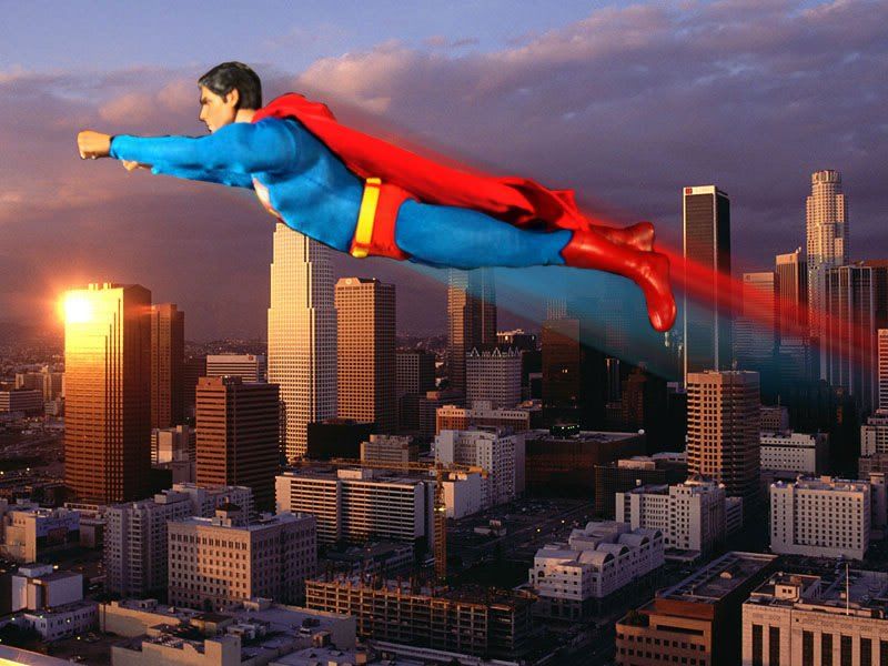 Gambar wallpaper superman yang sedang terbang